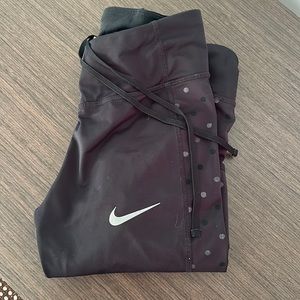 Nike running pants with reflective dots